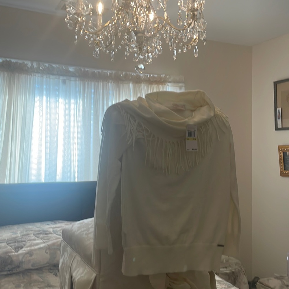 Beautiful cowl neck sweater with fringe
